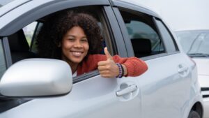 woman sitting in car